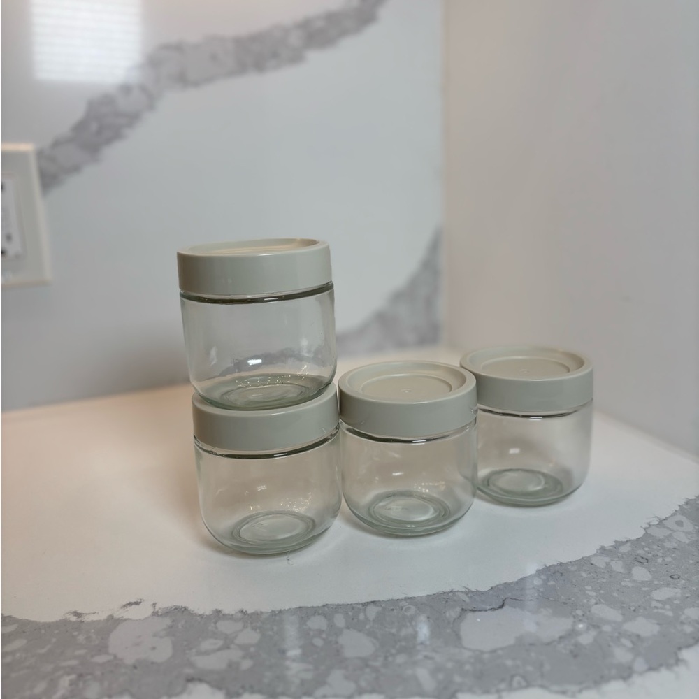 Set of 4 Clear Glass Jars with Cream Lid